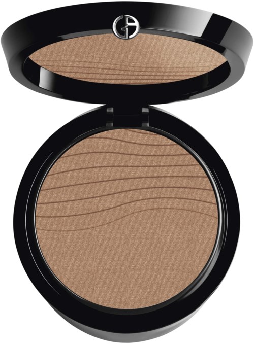 A round makeup compact with a black cover and a beige, textured powder inside. The cover has a small logo.