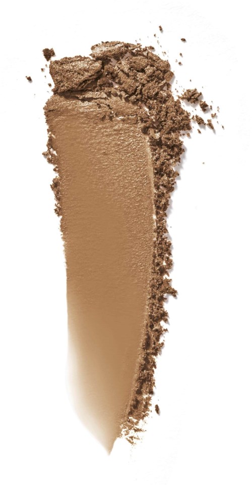 Knust beige pulver med noen spredte smuler og en jevn, langstrakt form.