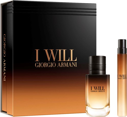 Giorgio Armani I Will fragrance gift set with a perfume bottle and rollerball in front of a black and copper box.
