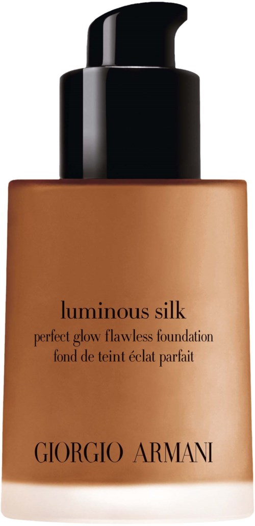 Eine Flasche von Giorgio Armani Foundation mit Pump, bezeichnet 'luminous silk' und 'perfect glow flawless foundation.'