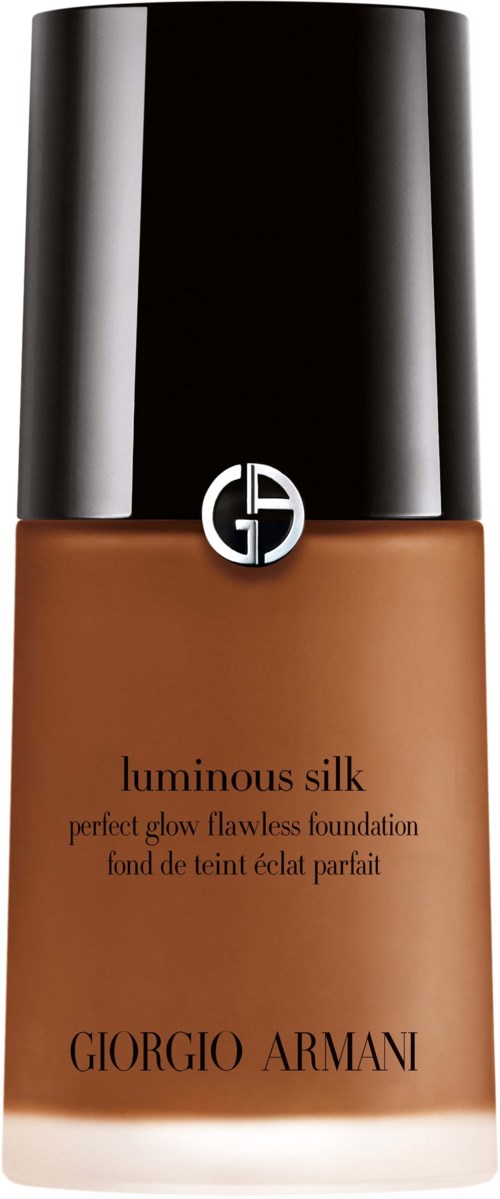 En makeupgrundfärgburk med svart lock, brunt flytande innehåll och Giorgio Armani-ikon.