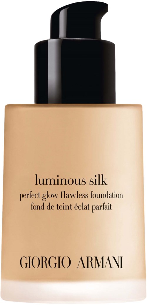En beige foundationflaska med svart pump, märkt 'Luminous Silk' av Giorgio Armani.