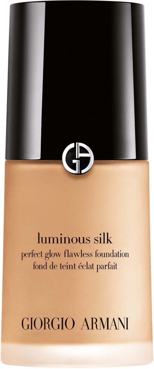En flaska av Giorgio Armani Luminous Silk-grundning med svart lock och beige vätska inuti.