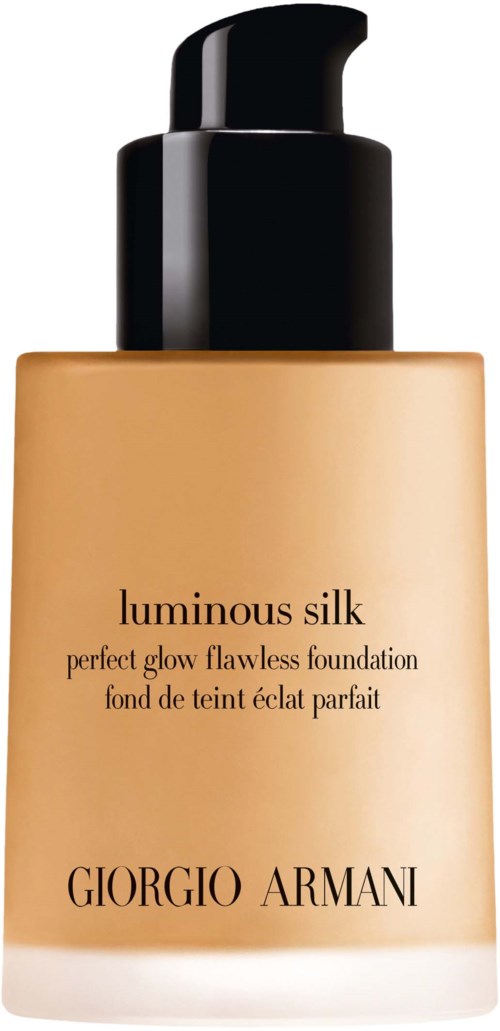 En beige foundationflaska med svart pump, märkt 'Luminous Silk' av Giorgio Armani.