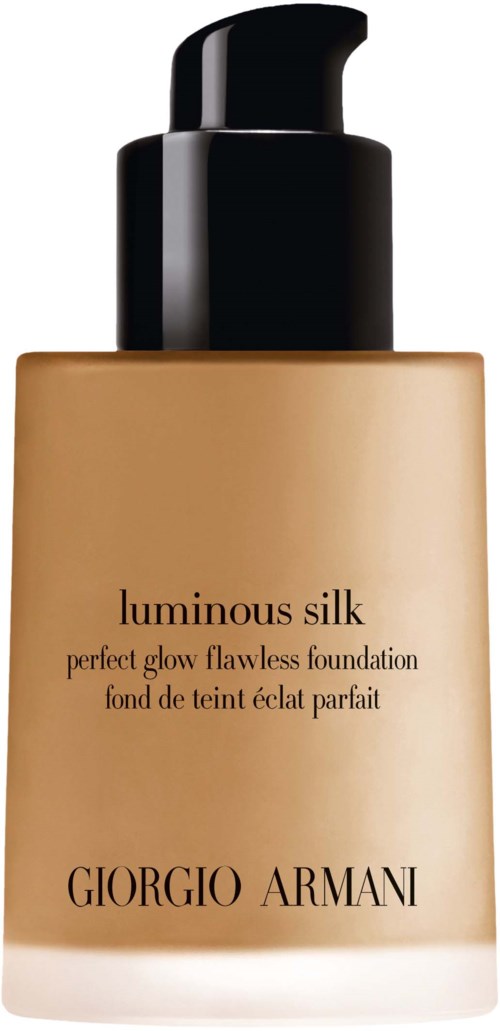 En foundationflaska med beige vätska och svart pump, märkt "Luminous Silk" av Giorgio Armani.