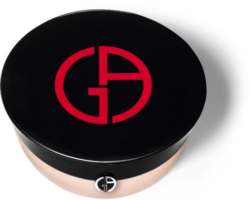 Ein runder Compact mit schwarzem Deckel, rotem Logo und kleinem G-Zeichen an der Seite.