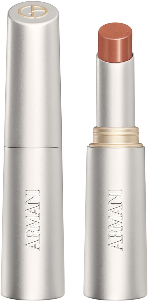 Ein Lippenstift in einer eleganten silbernen Hülse mit goldenen Akzenten, bezeichnet Archangel, teilweise geöffnet zeigt hellbraune Farbe.