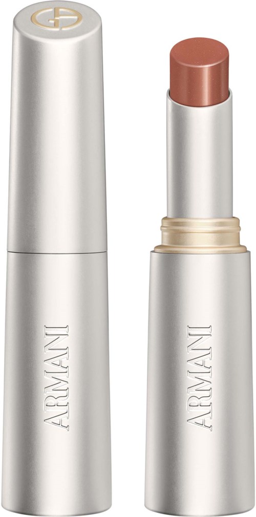 Ein silberner Lippenstift mit beige Farbe, eines mit Deckel, das andere offen.