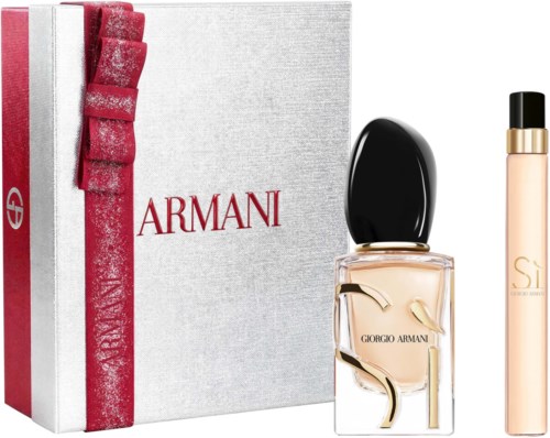 Giorgio Armani parfymeflaske med svart kork, ved siden av en hvit eske med rød sløyfe og Armani-logo.