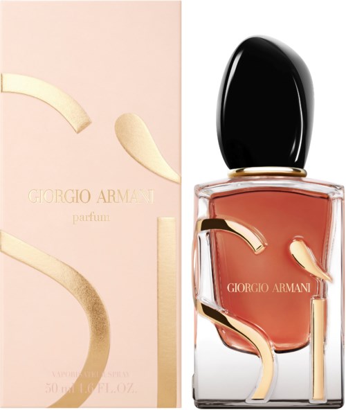A Giorgio Armani perfume bottle with a black cap and pink liquid, next to a soft pink box with gold details.
