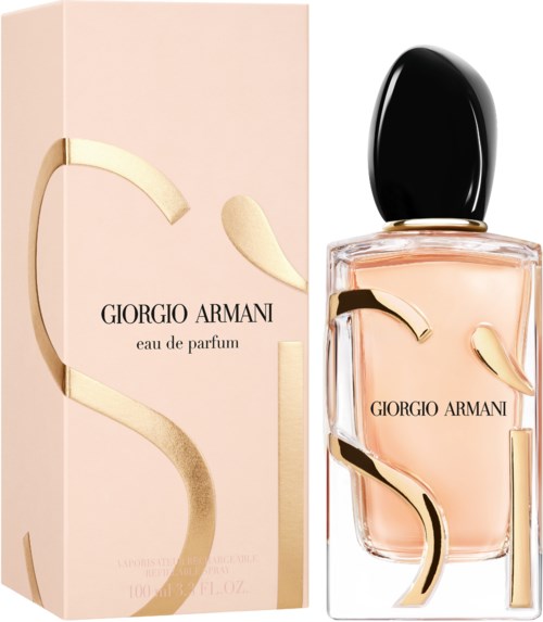 Parfümverpackung mit 'Sì' und 'Giorgio Armani' in Schwarz, in einer sanften rosa Farbgebung.