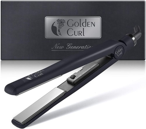 Een zwarte haarmolen met een doos op de achtergrond met 'Golden Curl' en 'New Generation' erop.