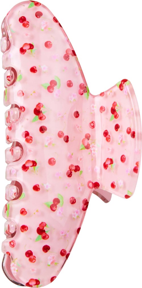 Ein Kuchen in Flugzeugform mit rosa Glasur und roten und grünen Früchte-Details.