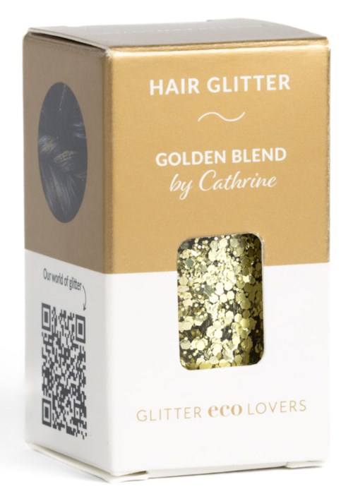 Eine goldene und weiße Box mit der Aufschrift 'Hair Glitter' und einem Fenster, das Goldglitter zeigt. Es steht 'Golden Blend by Catherine'.