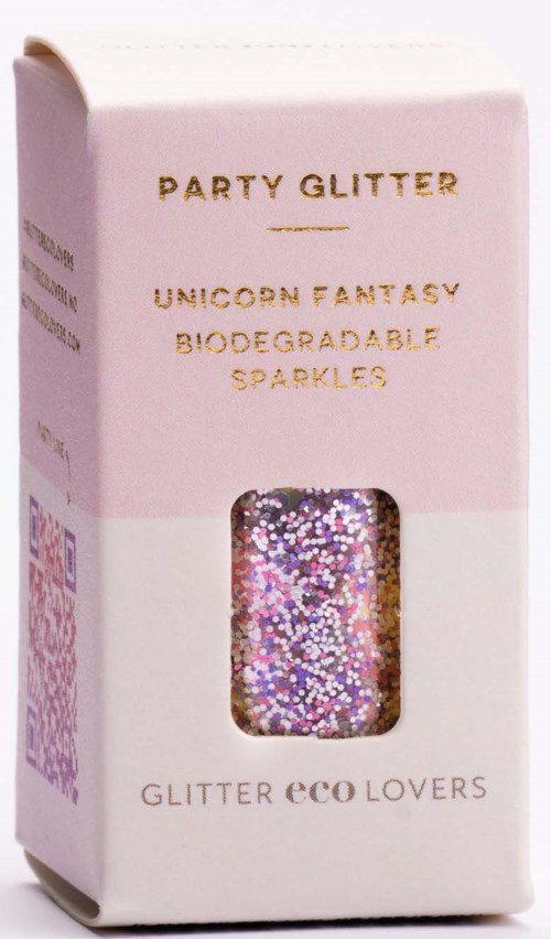 Kleine rosa Verpackung mit goldenem Text, kleines Fenster zeigt Regenbogenglimmer, steht 'Party Glitter, Unicorn Fantasy, Biodegradable Sparkles'.