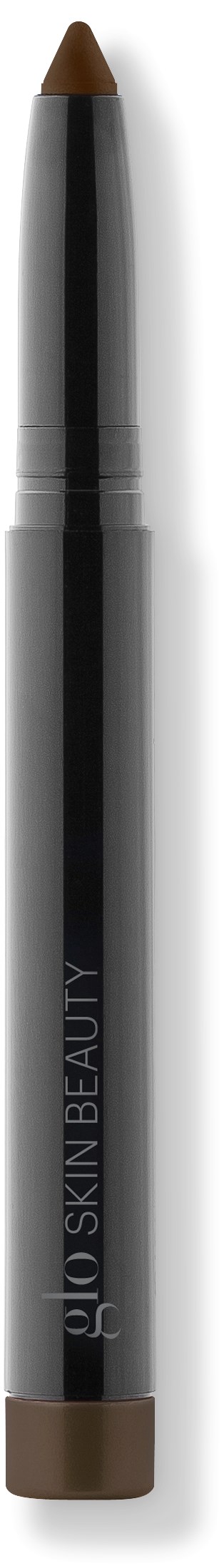 A black and silver makeup brush with a brown tip, labeled 'Skin Beauty.'