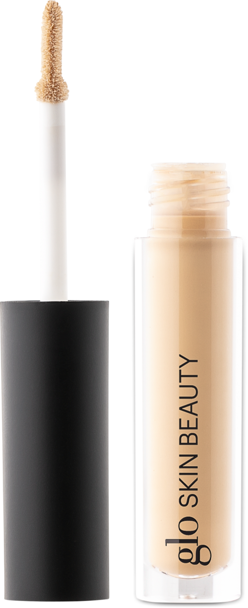 The image shows a tube of concealer with a wand applicator, labeled 'glo SKIN BEAUTY'.