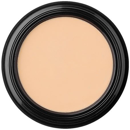 A round compact with beige pressed powder, surrounded by a black plastic case.