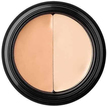 A round makeup compact with two shades of beige, one darker and one lighter, separated in the middle.