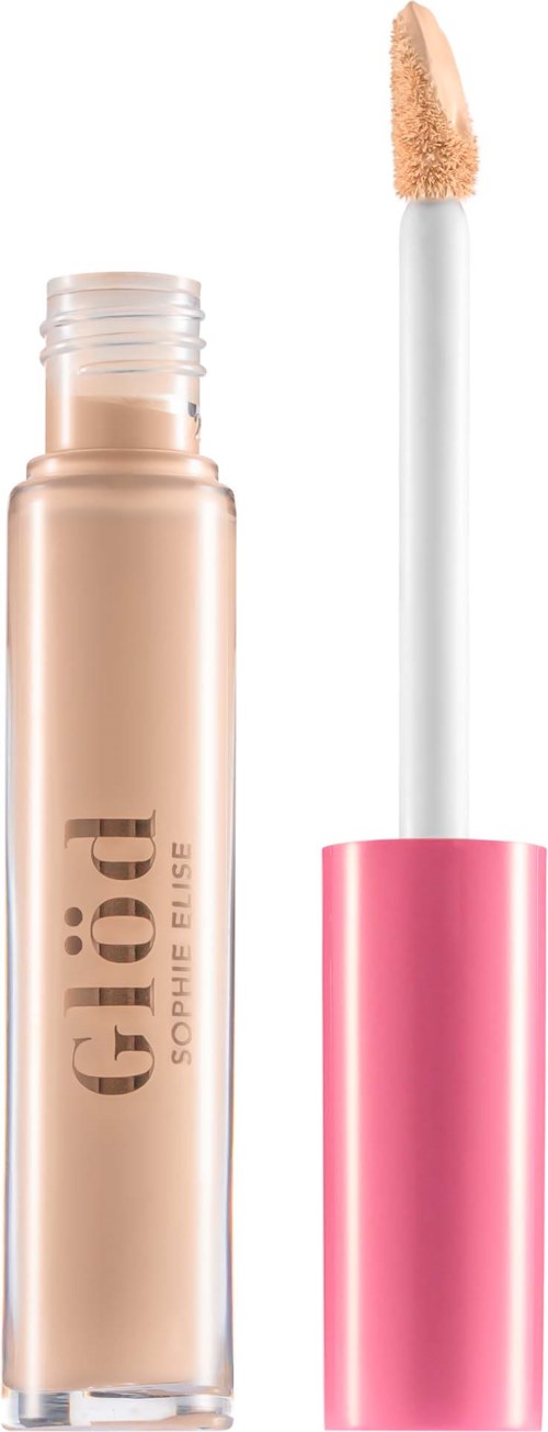 En flytende concealerrør med rosa hette og applikatorspiss med beige produkt. Røret er merket Glo.