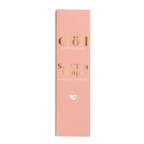 Eine rosa Verpackung mit goldenen und weißen Texten für ein Selbstbräunungsprodukt von Sophie Elise. Es heißt 'Glöd' und 'Gradual Tanning'.