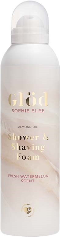 A white bottle of shower and shaving foam with a clear cap, labeled with scent and brand details.