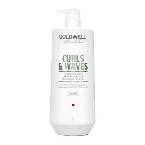 A white bottle of Goldwell Curl & Waves shampoo with a pump top, labeled for curly hair care.