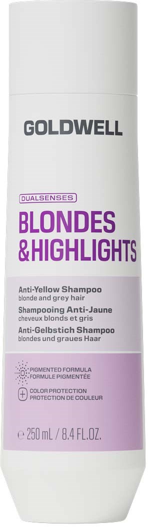 En hvit flaske med Goldwell Blonde & Highlights anti-gul sjampo med lilla og svart etikett.