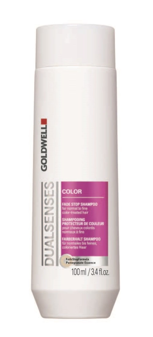 En vit flaska med Goldwell Dualsenses Color-schampo, 100 ml, med lila etikett och vit kork.