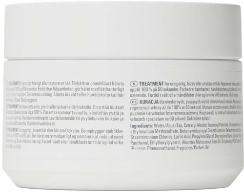 Baksiden av en hvit hudpleiekrukke med produktbeskrivelse, ingrediensliste og bruksanvisning på flere språk.