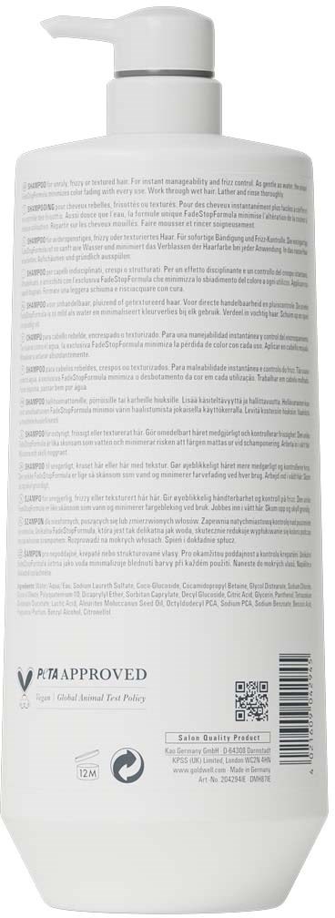 Baksiden av en hvit sjampo flaske med pumpe som viser tekst og strekkode.