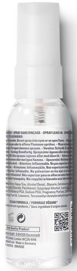 Liten gjennomsiktig sprayflaske med hvit lokk og detaljert produktinformasjon.