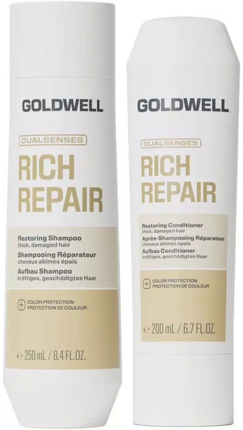 To hvite flasker med Goldwell Rich Repair hårprodukter, en restoring sjampo og en restoring balsam, med gull og svart tekst.