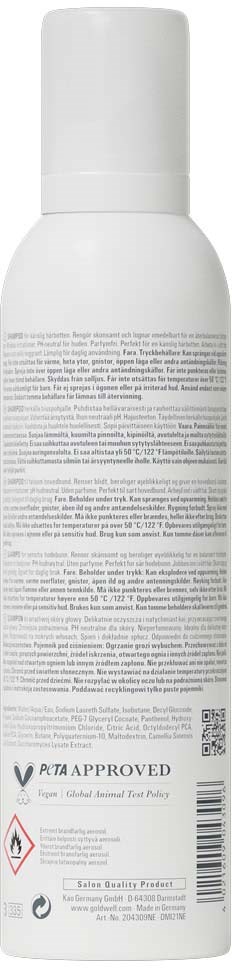 Hvit flaske med lokk, inneholder et skjønnhetsprodukt, med detaljert tekst og sikkerhetsmerker på etiketten.