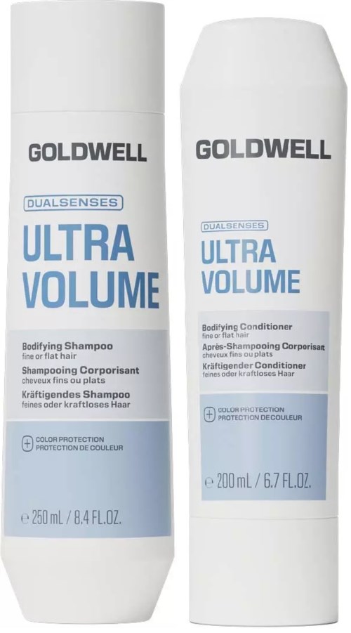 To hvite flasker med Goldwell Ultra Volume hårpleieprodukter, en sjampo og en balsam, med blå og svart tekst.