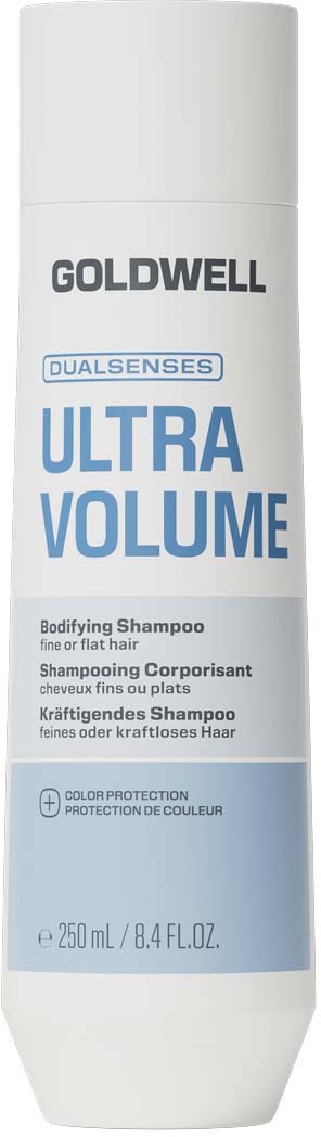 En hvit flaske med Goldwell Ultra Volume sjampo med blå og svart tekst, 250 ml.
