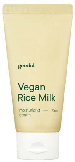 Veganiczna mleczko ryżowe nawilżający krem w beżowej tubce z zielonym tekstem. Prosty design. Marka to Goodal.