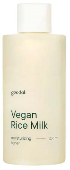 Jasno opakowanie oznakowane Vegan Rice Milk, nawilżający tonik, z białą nakrętką i prostym wzorem.
