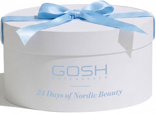 Punainen pyöreä laatikko, jossa sininen nauha ja rusetti, GOSH Copenhagen -logo ja teksti 24 Days of Nordic Beauty.