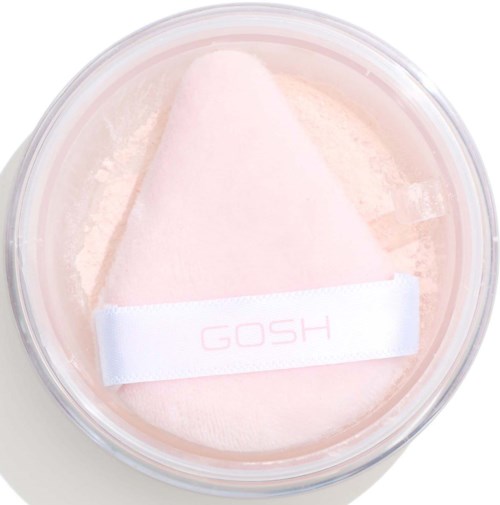 Een roze make-up spons met een witte band met de tekst 'GOSH' in een doorzichtige ronde container.
