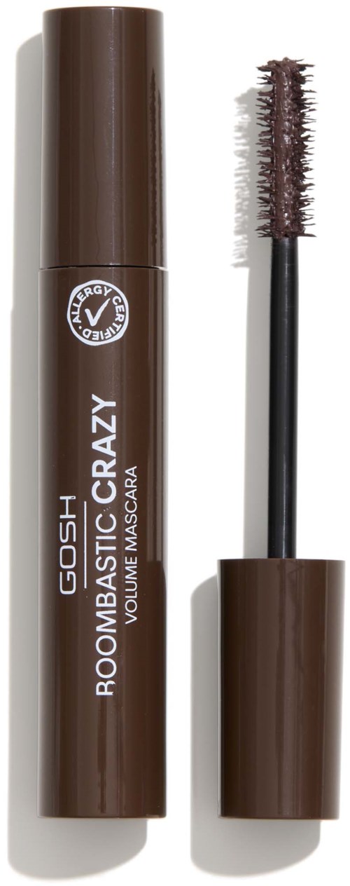 A brown mascara tube with the cap removed, revealing a spoolie brush for eyelash makeup.