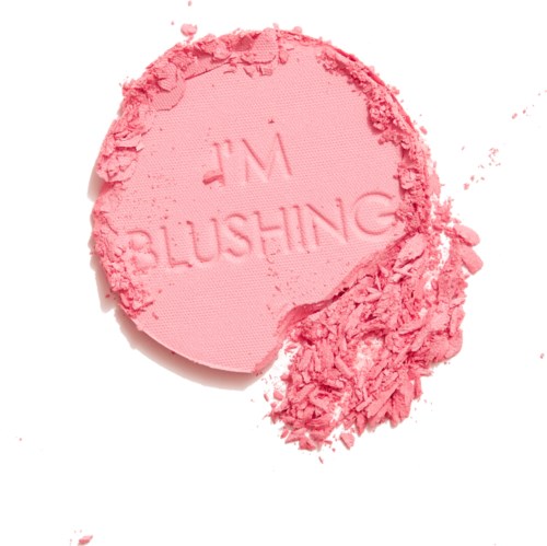 Rosa makeupprodukt med orden 'BLUSHING' och 'WF' präglade. En del är krossad runt kanterna.