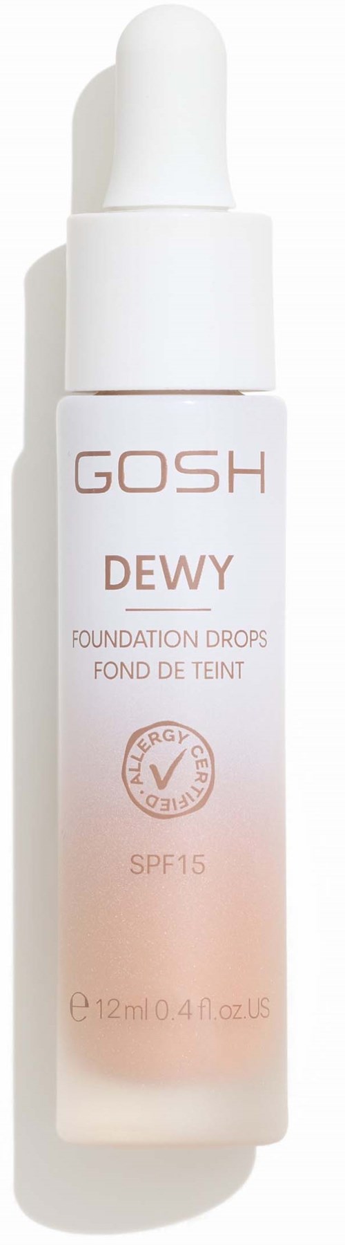 Eine weiße Flasche mit Tropfenverschluss, beschriftet 'GOSH DEWY' Foundations-Tropfen, SPF 15, für Hautglanz.