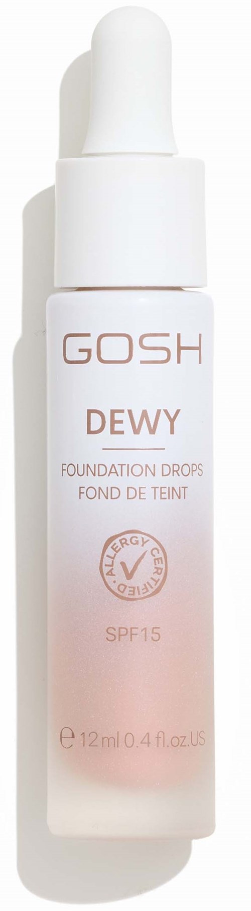 Eine weiße Flasche mit Tropfer, beschriftet GOSH Dewy Foundation Drops SPF 15.