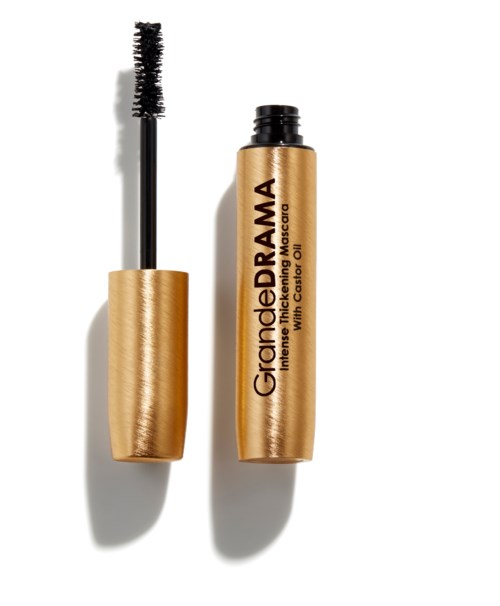 Een goudkleurige mascara-tube zonder de kwast, met het product zichtbaar.