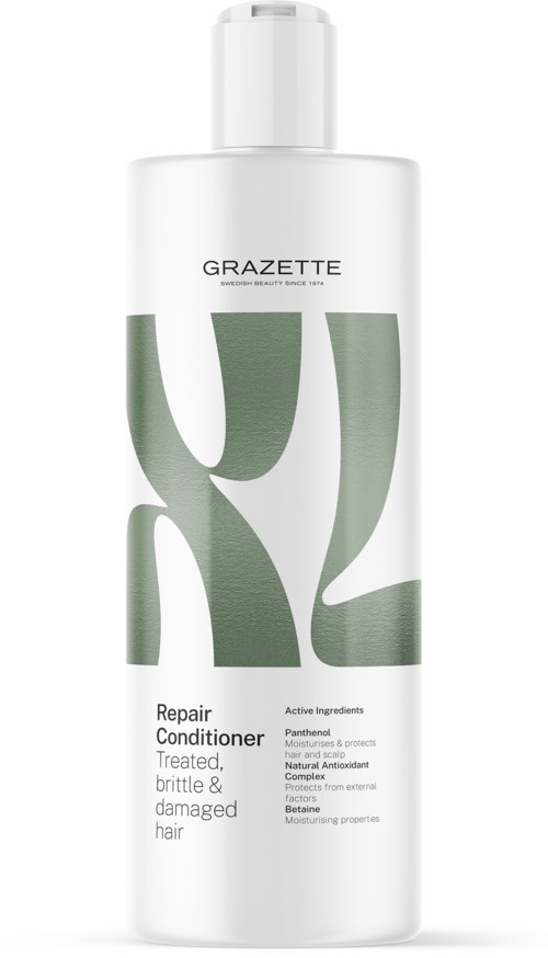 Een witte fles Gazette Repair Conditioner voor behandeld, breekbaar en beschadigd haar.