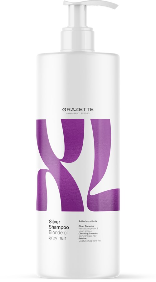 Een witte fles met paarse letters en een dispenser bovenop. Het is een shampoo voor blond of grijs haar.