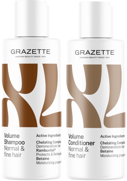 Twee witte flessen met 'GRAZETTE' voor haarverzorging, één voor volume shampoo en één voor conditioner, voor normaal en fijn haar.