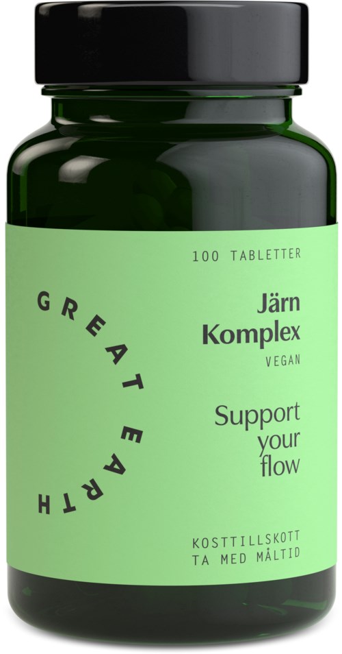 A green bottle of dietary supplement tablets with label indicating it's vegan, supports flow, and is called Järn KompleX.