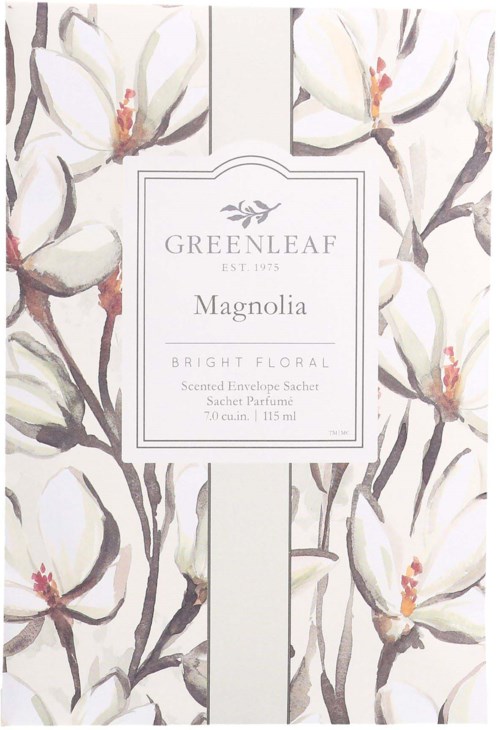 A floral design with white flowers and dark branches, featuring a centered label for Greenleaf Magnolia scented sachet.